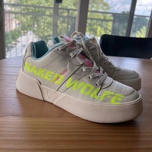 Naked Wolfe Pixie Logo Neon